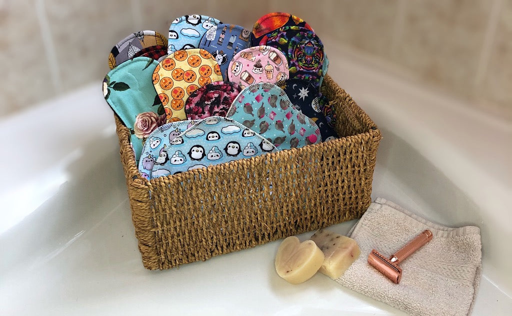 wicker basket with a variety of pretty colourful reusable pads
