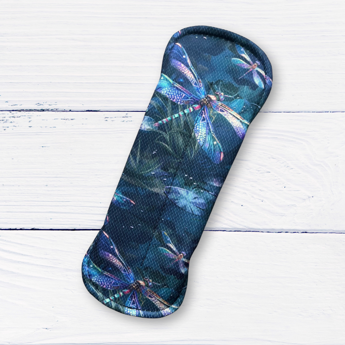 snapped light absorbency reusable pad in a dragonfly athletic wicking jersey